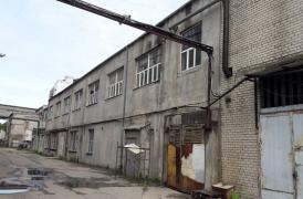 Manufacturing premises facade isolation 